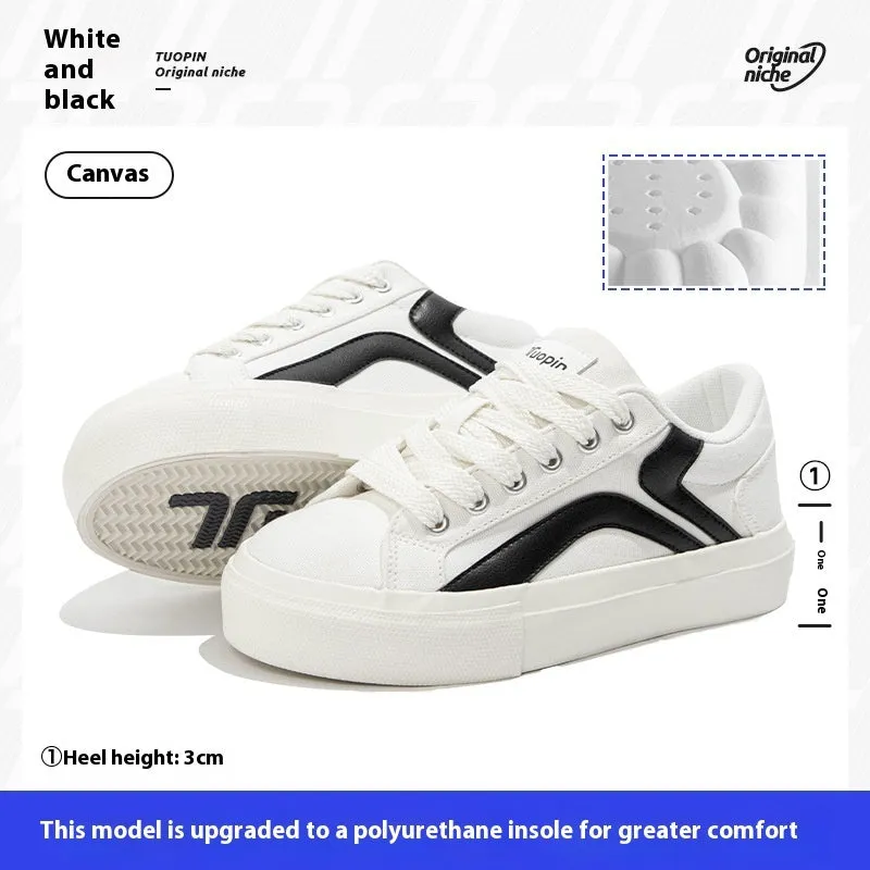 Women's low-top lace-up board shoes in blue, with a vulcanised rubber sole and round toe.
