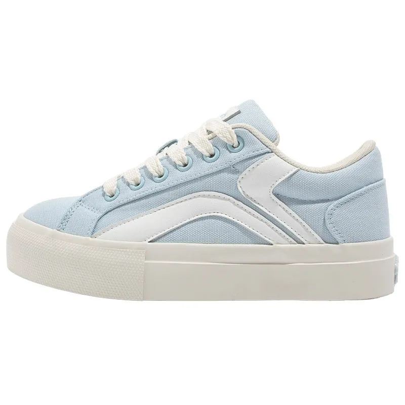 Women's low-top lace-up board shoes in blue, with a vulcanised rubber sole and round toe.