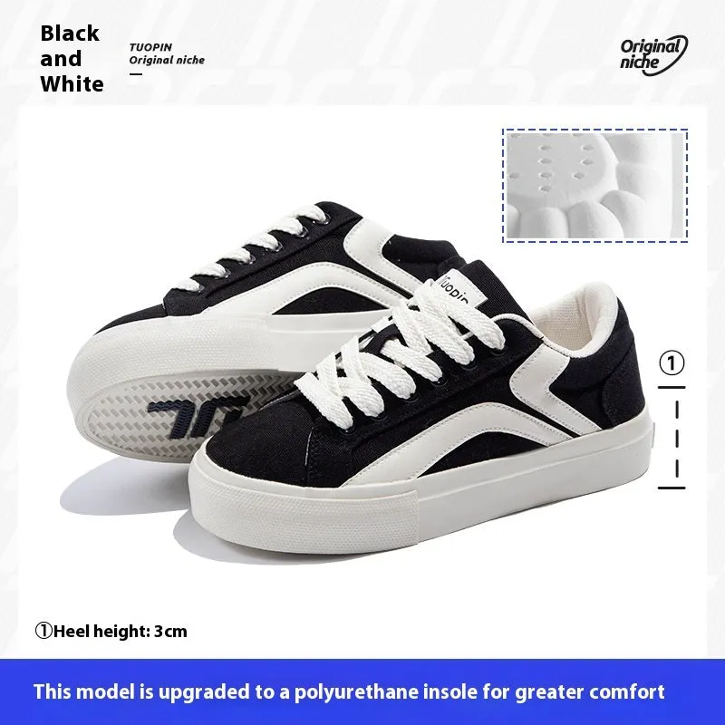 Women's low-top lace-up board shoes in blue, with a vulcanised rubber sole and round toe.