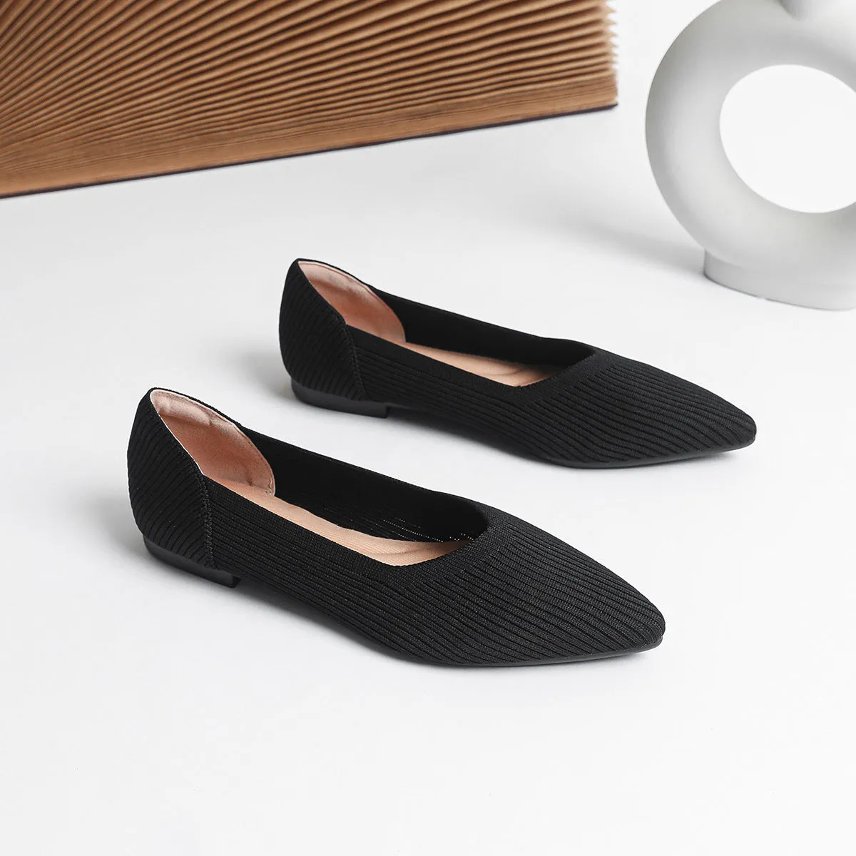 Women's apricot knit pointed flat pumps with a shallow mouth and rubber sole.