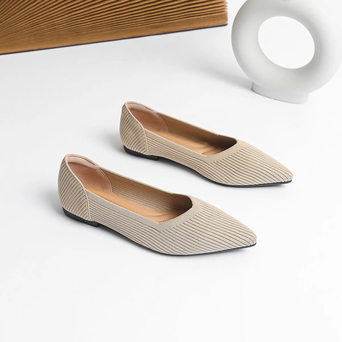 Women's apricot knit pointed flat pumps with a shallow mouth and rubber sole.
