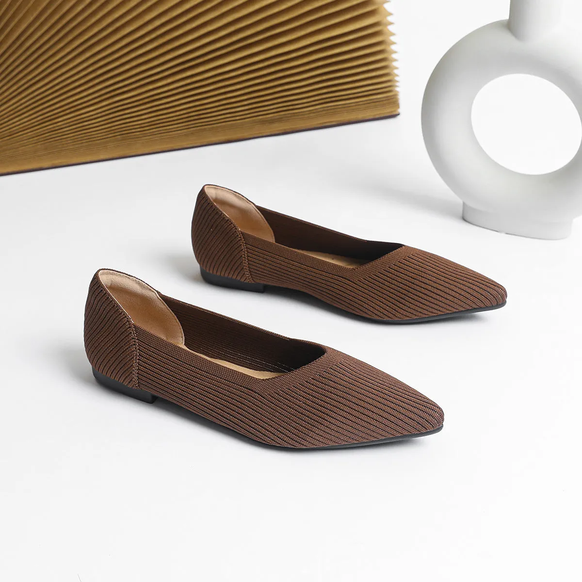 Women's apricot knit pointed flat pumps with a shallow mouth and rubber sole.