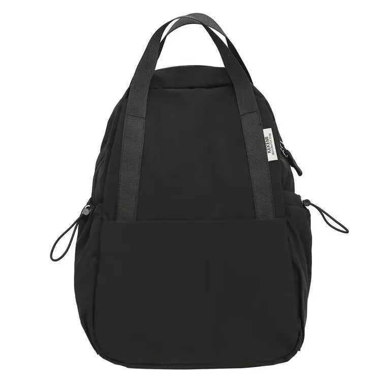 Solid colour nylon backpack in blue with curved straps and a lock, shown in a travel setting.