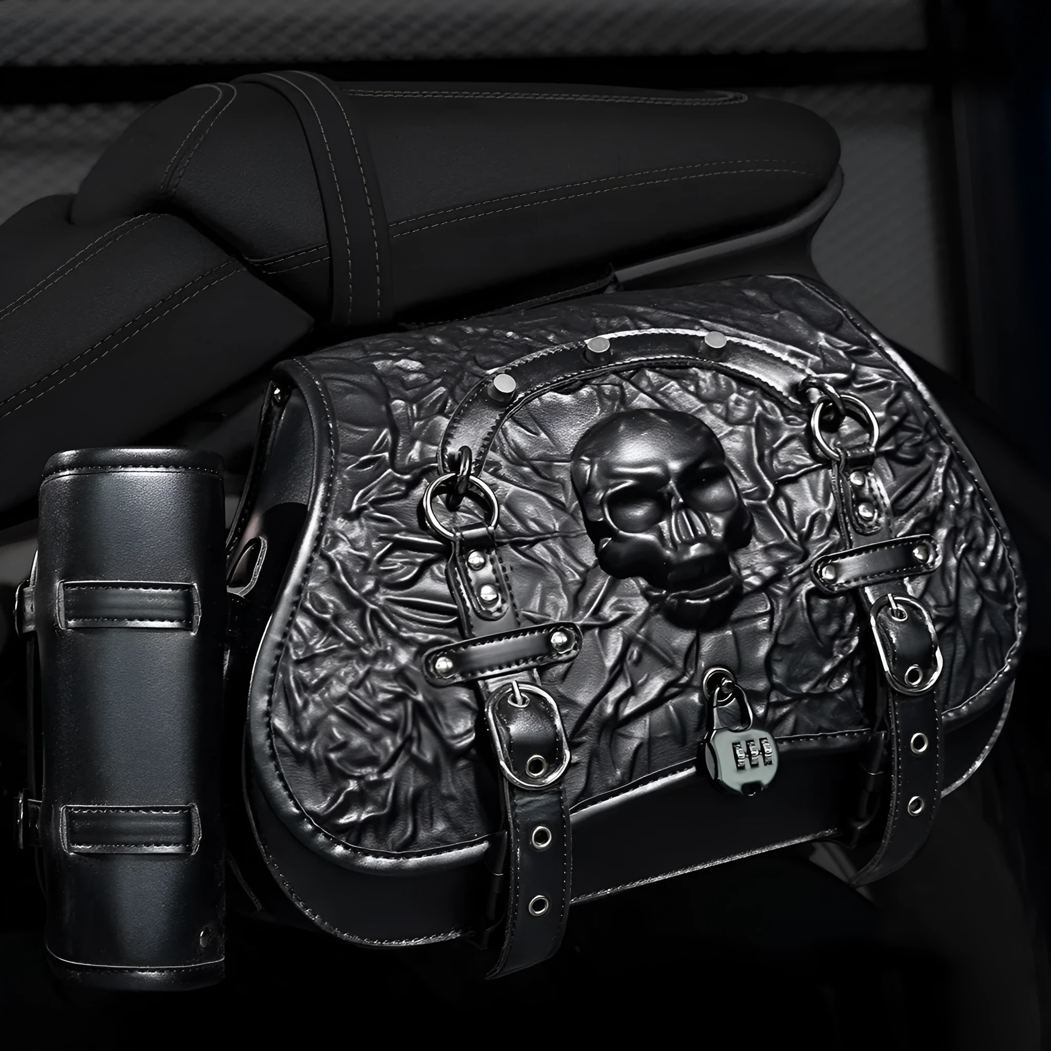 Pair of black PU synthetic leather motorcycle side luggage bags mounted on a modified bike frame.