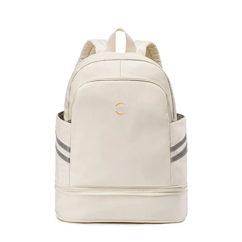 Women's travel backpack with dry-wet separation compartments in beige colour showing curved shoulder straps