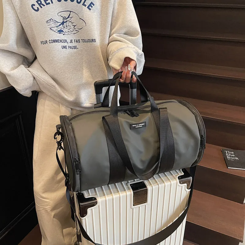 Oxford cloth waterproof sports handbag in black, dark gold or dark grey colours