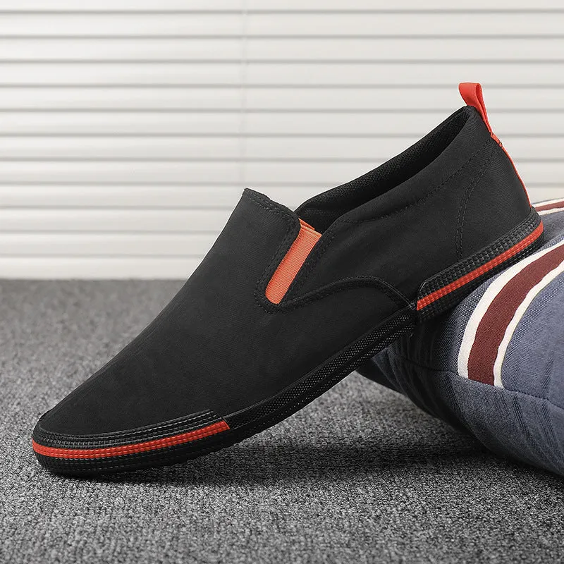 Men's casual canvas sneakers in grey, black orange, and khaki with vulcanised rubber soles