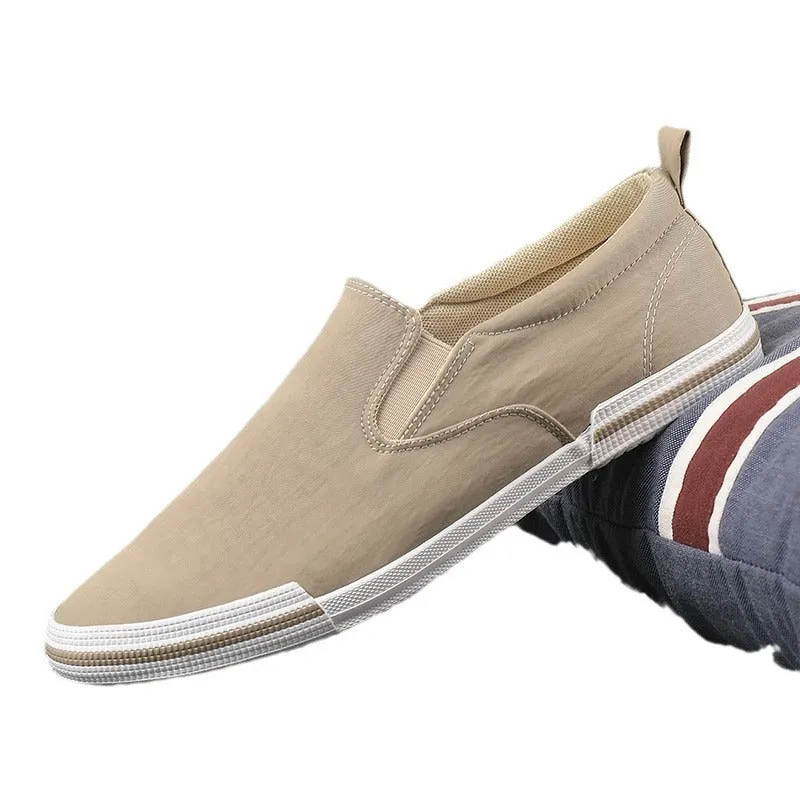 Men's casual canvas sneakers in grey, black orange, and khaki with vulcanised rubber soles