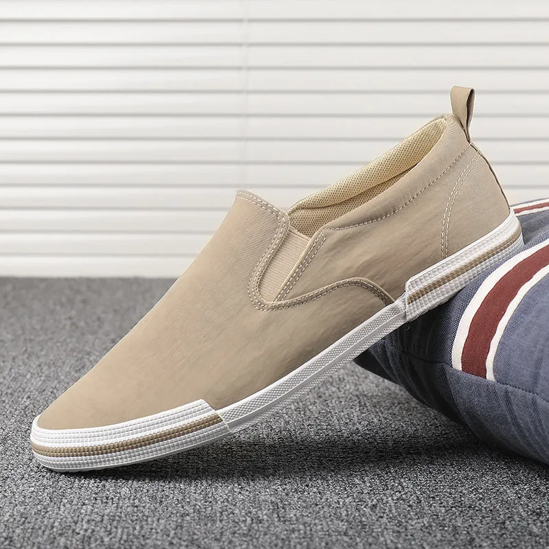 Men's casual canvas sneakers in grey, black orange, and khaki with vulcanised rubber soles