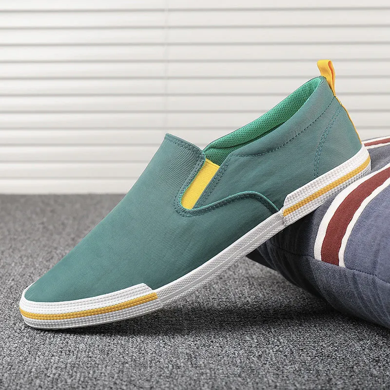 Men's casual canvas sneakers in grey, black orange, and khaki with vulcanised rubber soles
