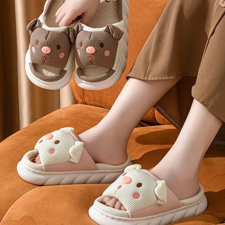 White linen open toe flip flop slippers for couples on a light background, showing PVC sole and strap detail.