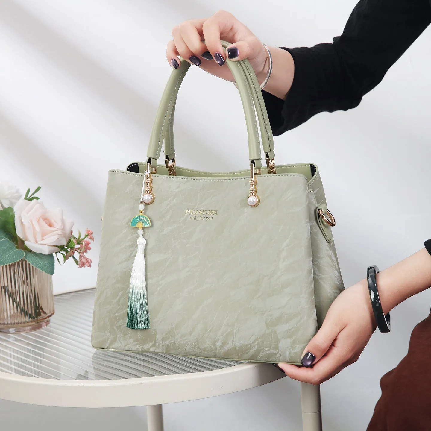Women's PU leather shoulder bag with horizontal square shape and slit pockets in ethnic-style finish
