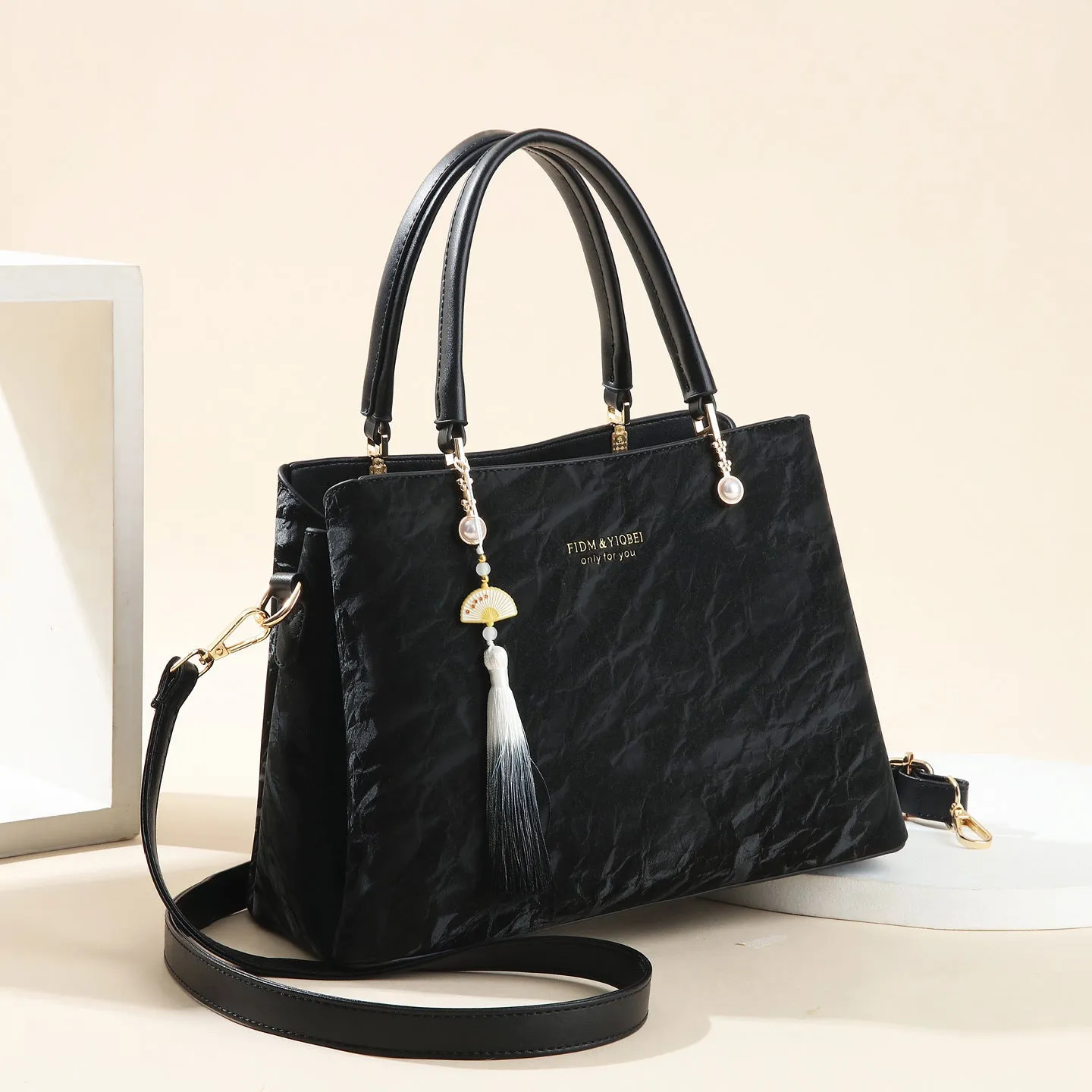 Women's PU leather shoulder bag with horizontal square shape and slit pockets in ethnic-style finish