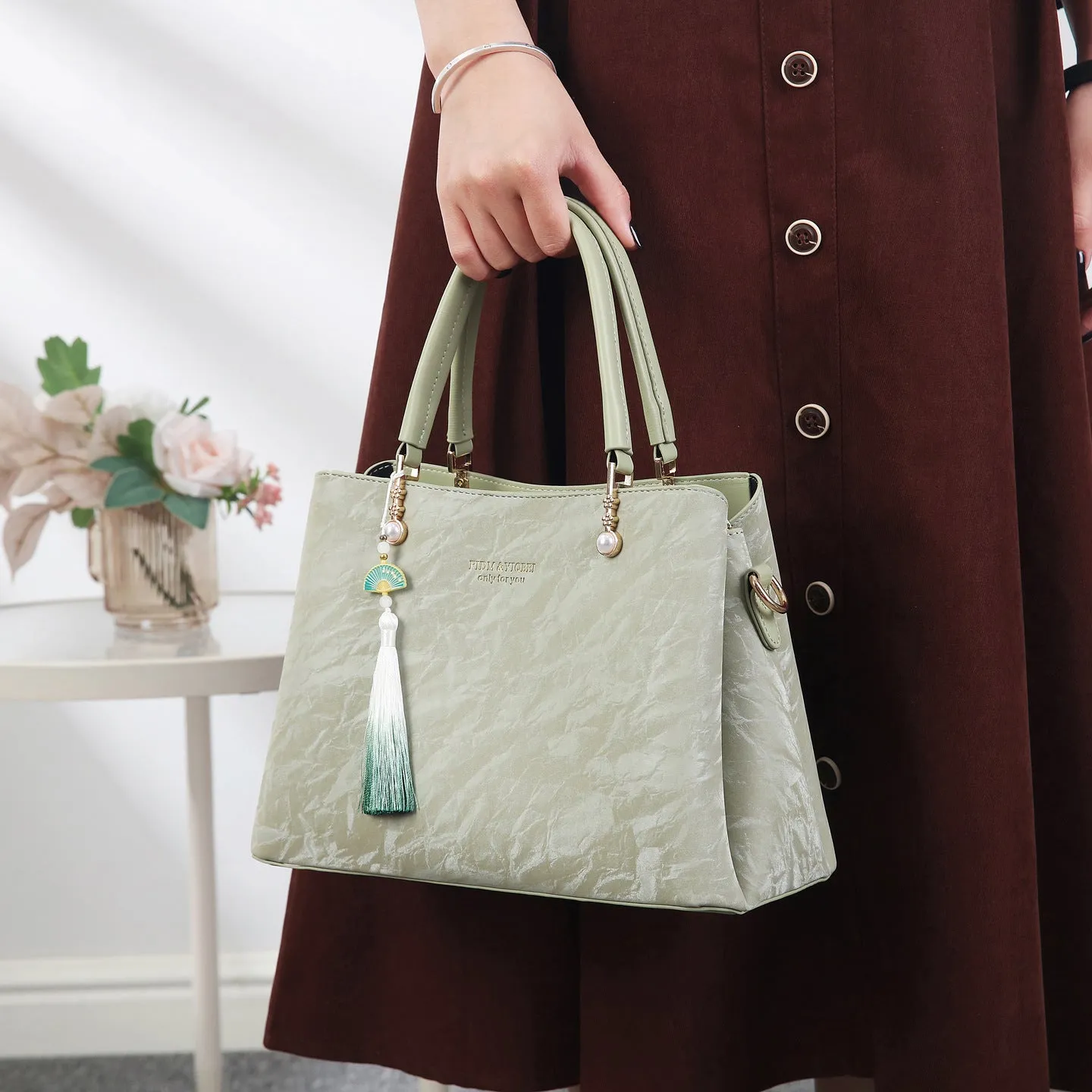 Women's PU leather shoulder bag with horizontal square shape and slit pockets in ethnic-style finish