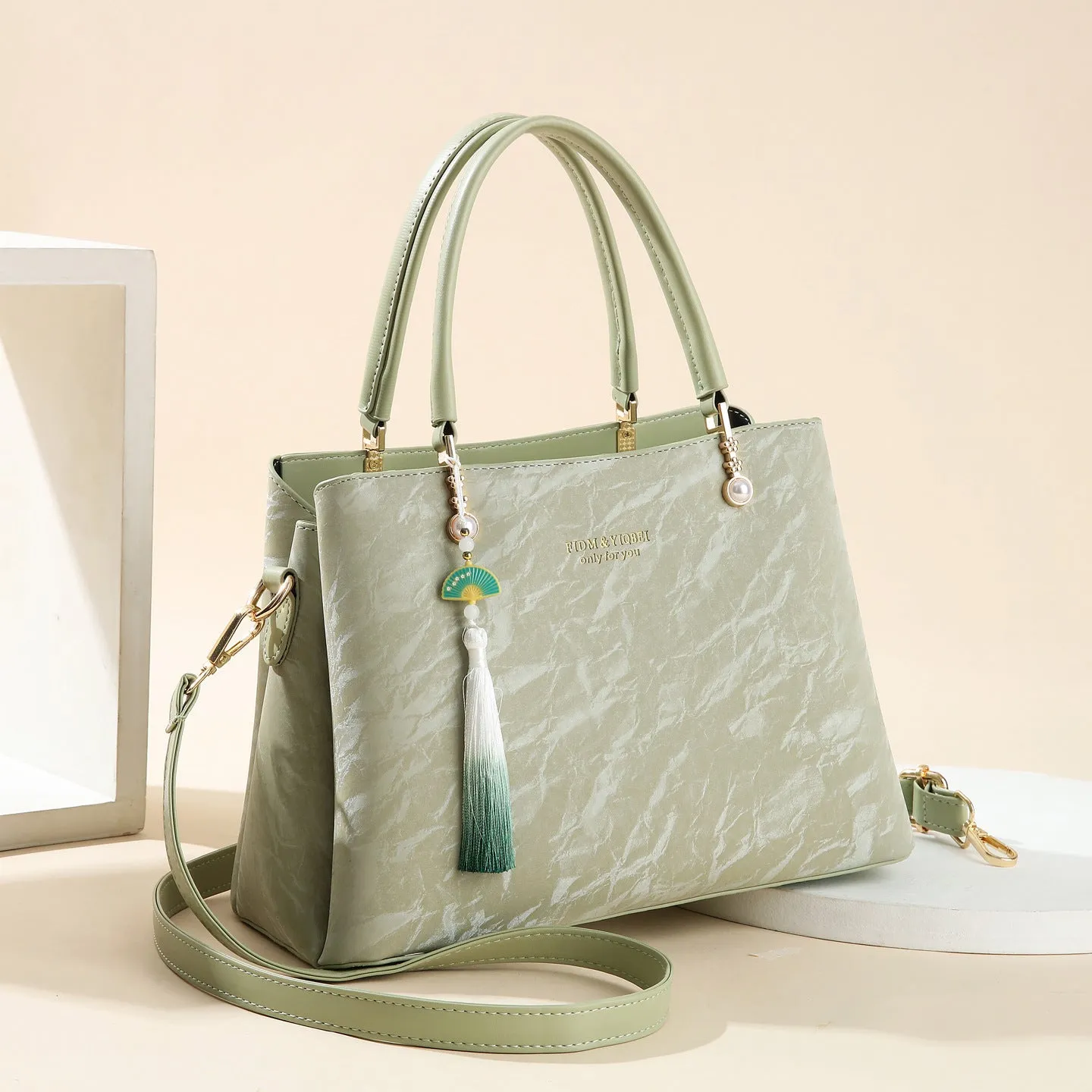 Women's PU leather shoulder bag with horizontal square shape and slit pockets in ethnic-style finish