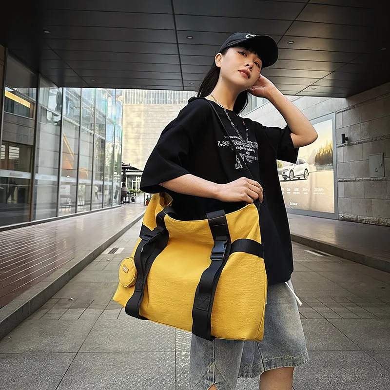 Grey Oxford cloth men's travel shoulder bag showing main compartment and detachable coin purse.