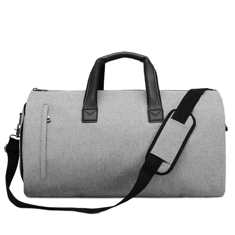 Oval-shaped medium travel bag in light grey with multiple internal compartments for wet-dry separation and organisation.