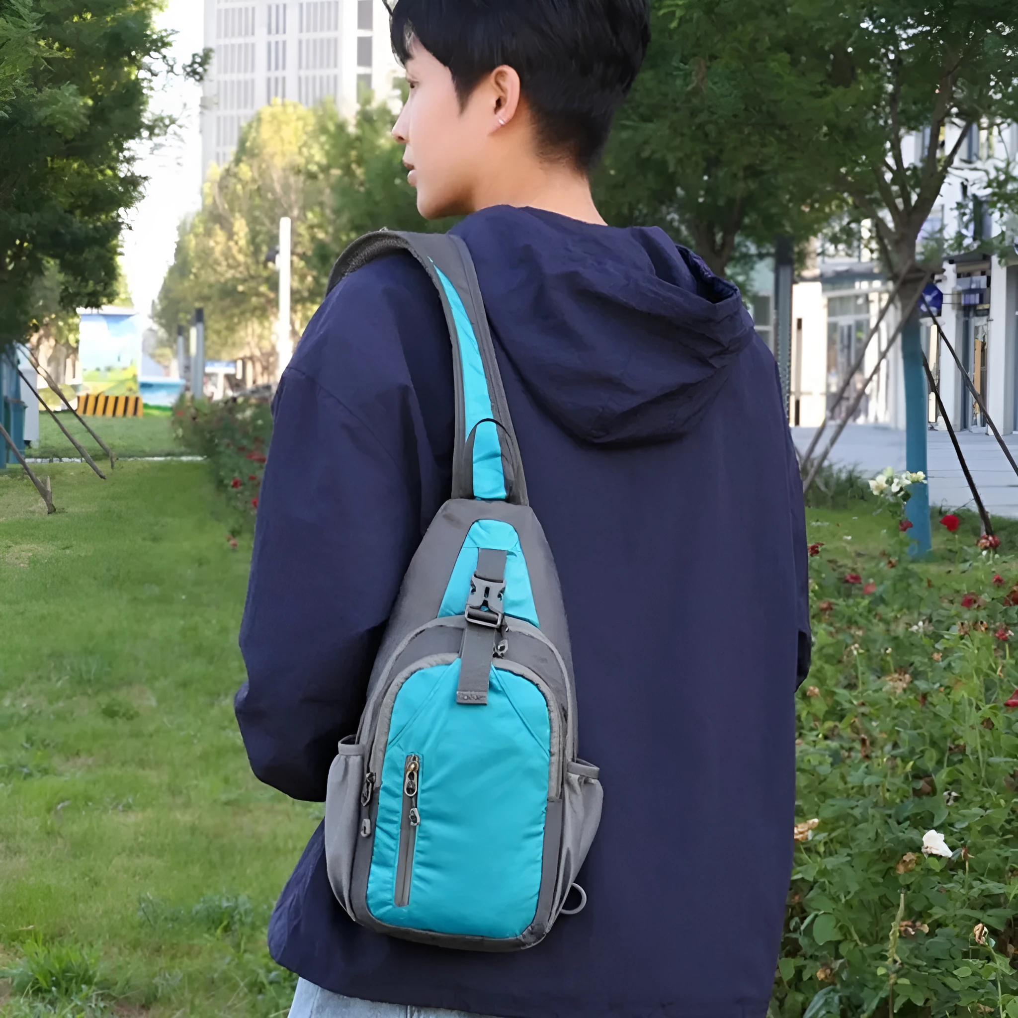Nylon canvas crossbody chest bag in army green colour with contrast details for outdoor leisure use.