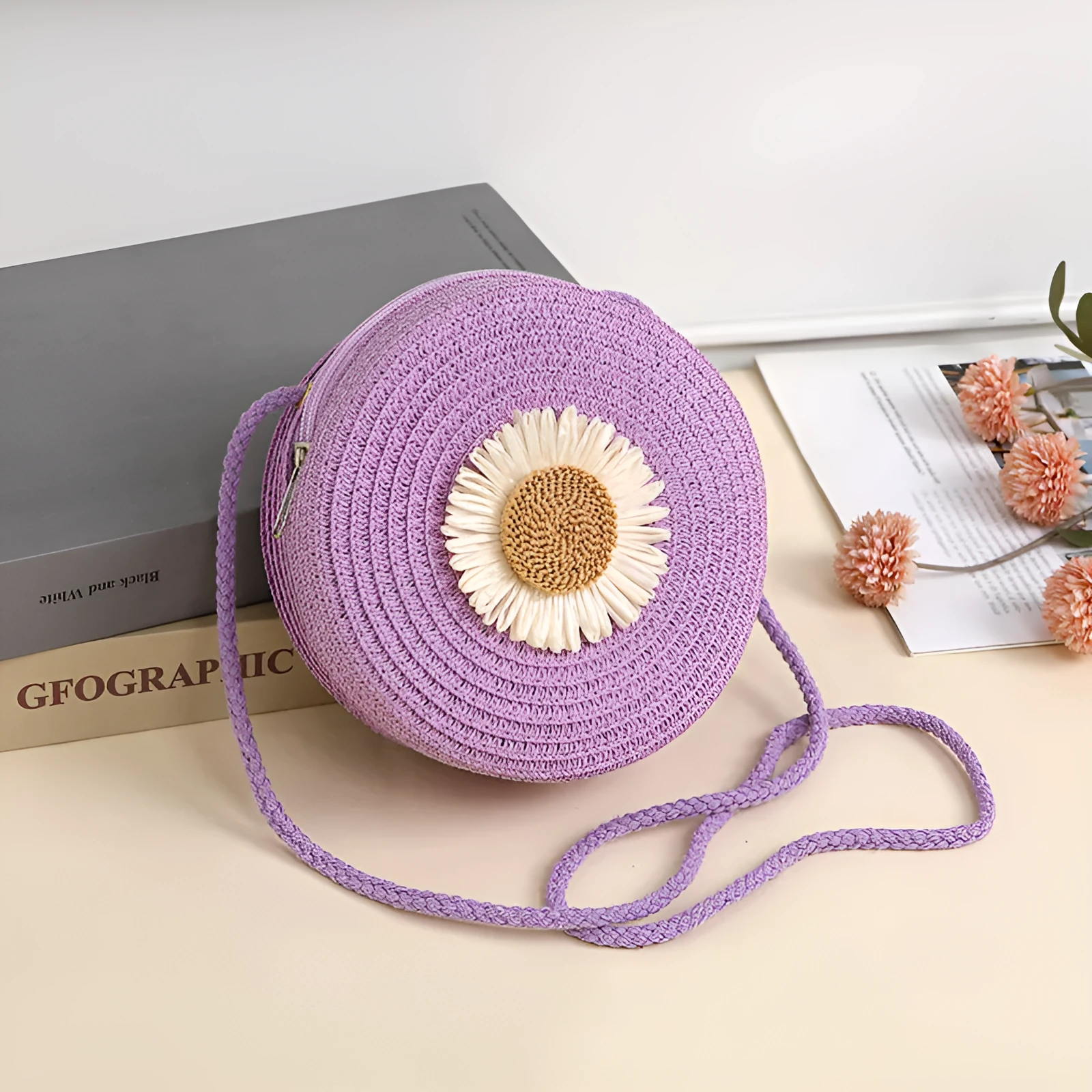 Woven straw crossbody bag in pastoral style, shown in one of eight colours, designed to hold a mobile phone.