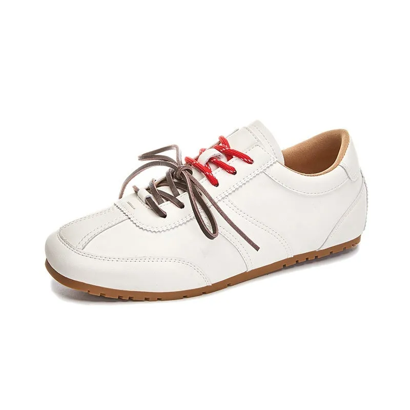 Women's white casual lace-up shoes with horsehair flocked detailing on leather upper, flat heel and round toe.