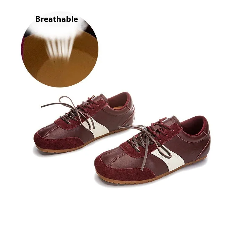 Women's white casual lace-up shoes with horsehair flocked detailing on leather upper, flat heel and round toe.