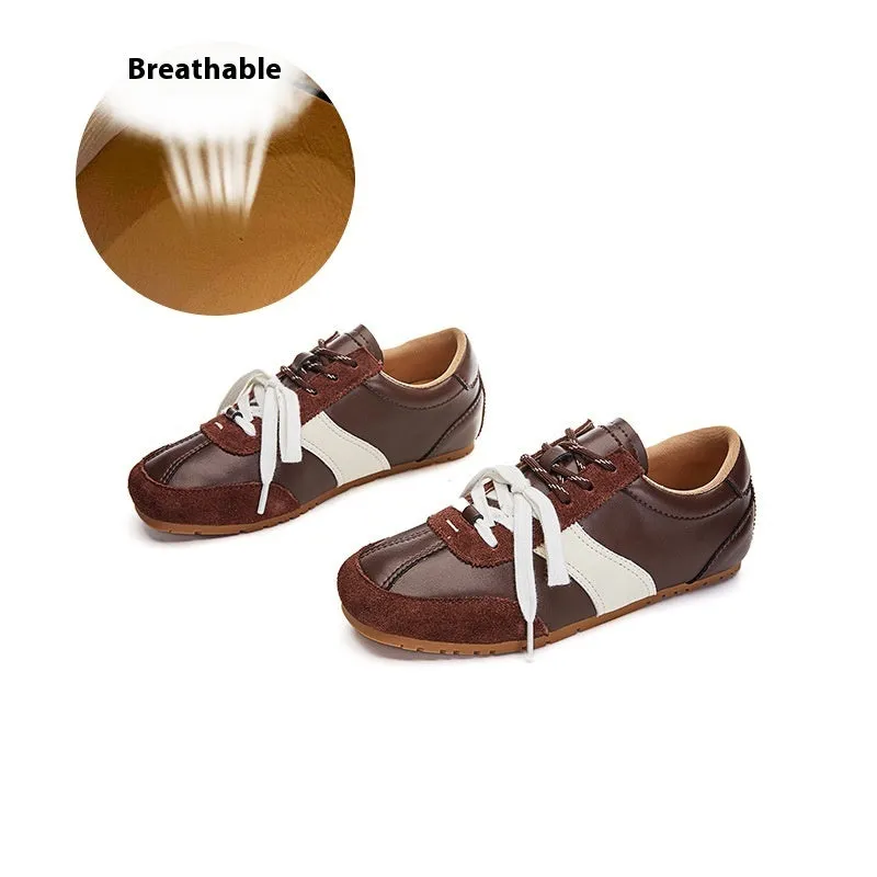 Women's white casual lace-up shoes with horsehair flocked detailing on leather upper, flat heel and round toe.