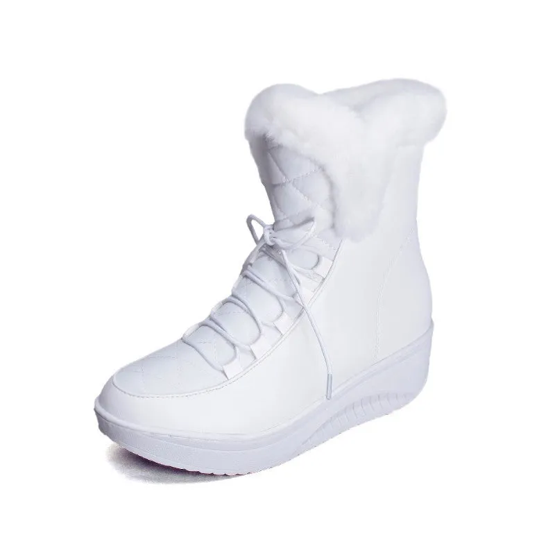 Black women's lace-up winter boots with a platform sole on a neutral background.