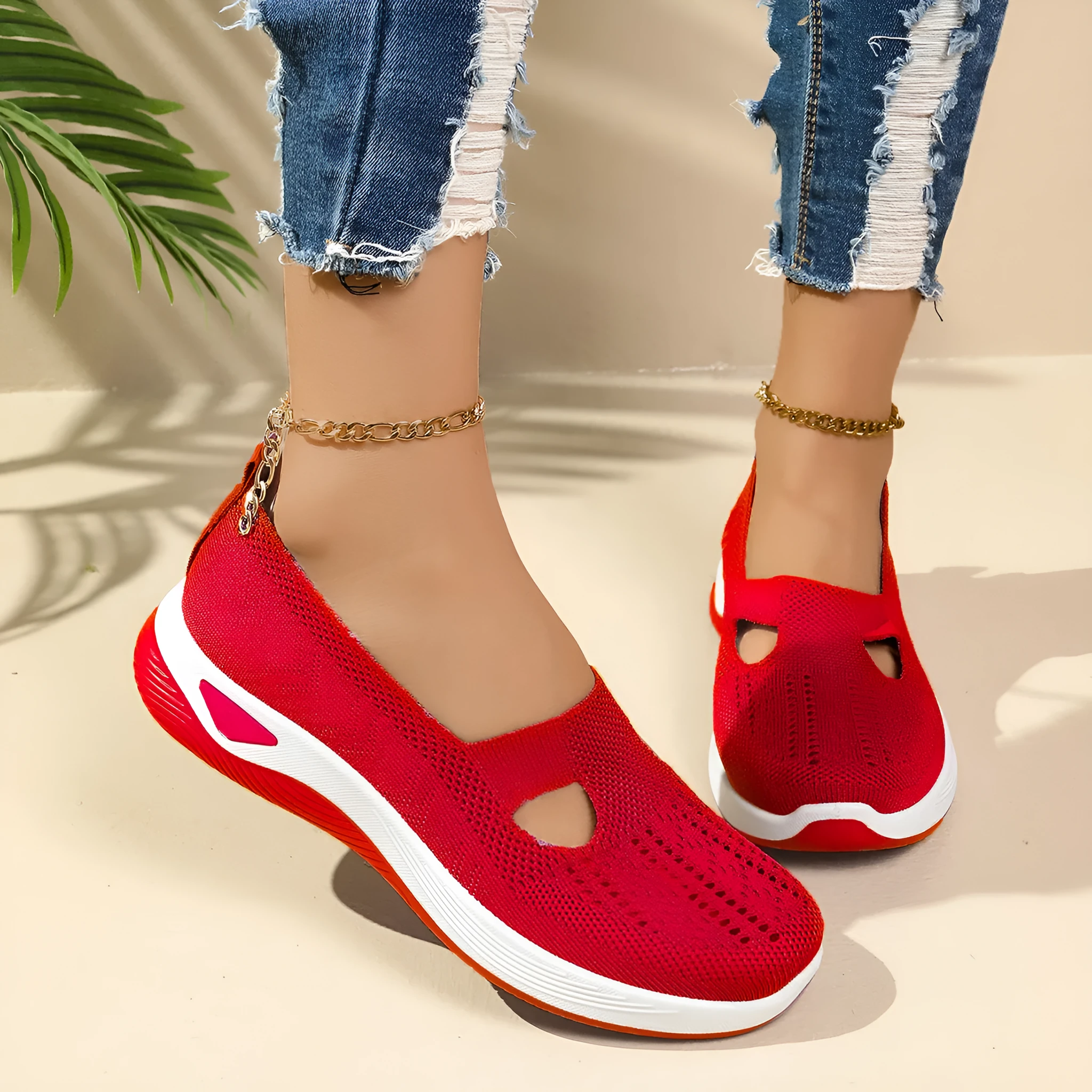 Women's low-top slip-on shoe in Flyknit mesh, shown in a choice of colours with a soft PVC sole.
