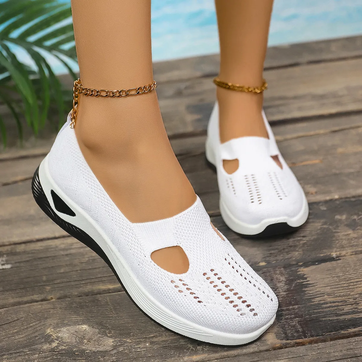 Women's low-top slip-on shoe in Flyknit mesh, shown in a choice of colours with a soft PVC sole.