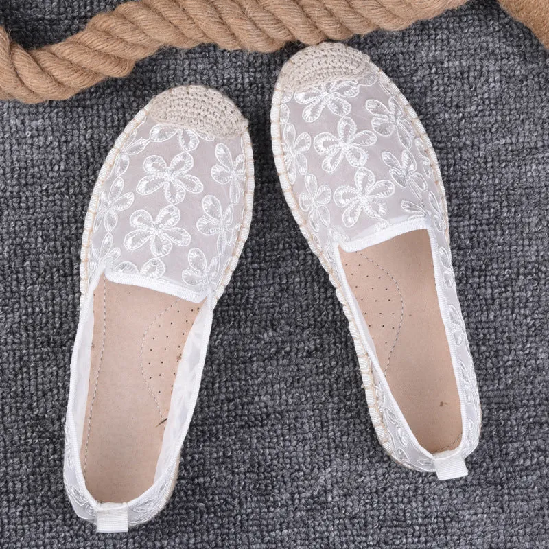 Women's flat-heel linen fisherman shoes in pansy white with sewing thread detail and round toe.