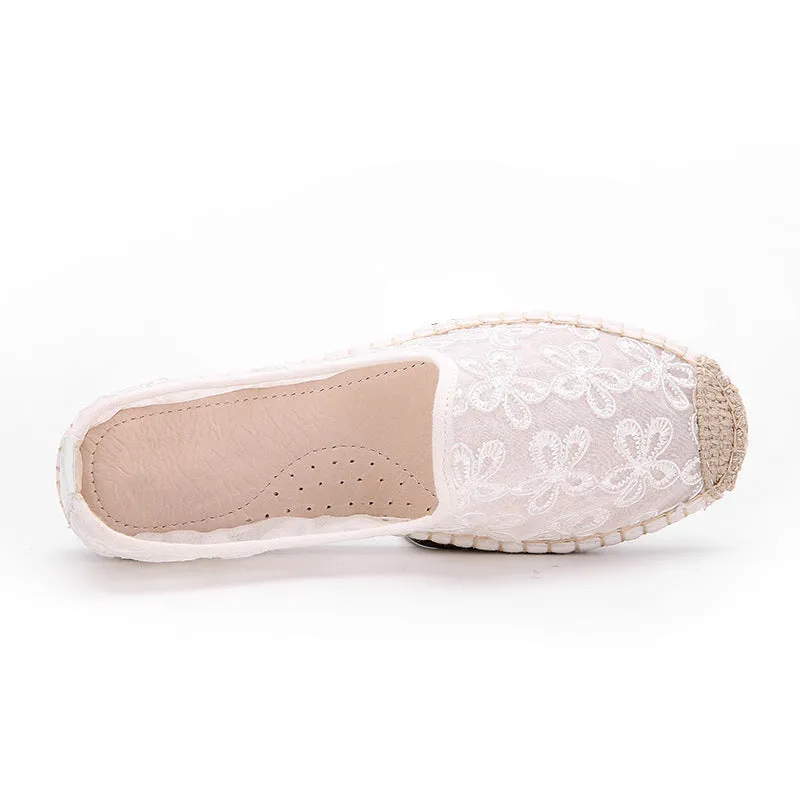 Women's flat-heel linen fisherman shoes in pansy white with sewing thread detail and round toe.
