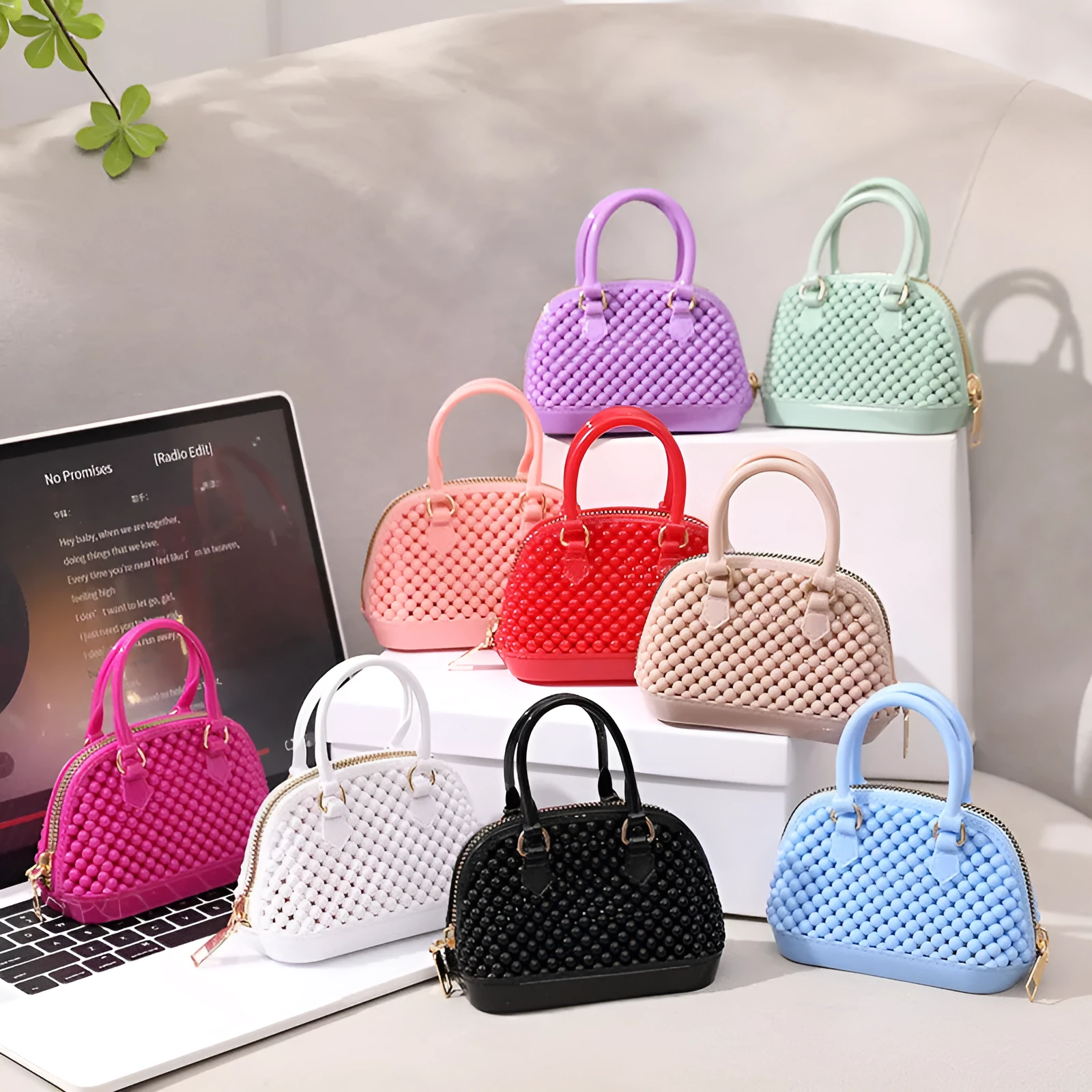 Translucent PVC jelly shell handbag with hollowed design and metal chain strap in apricot colour