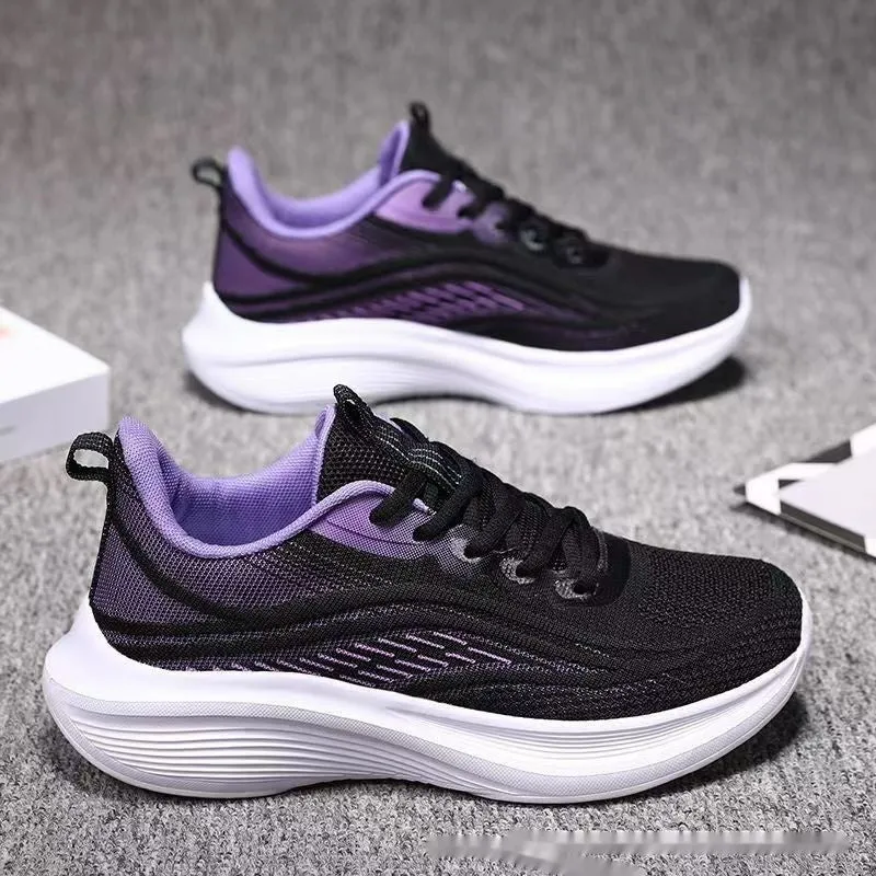 Women's low-top mesh running shoes in light pink with a round toe and front lace-up closure.