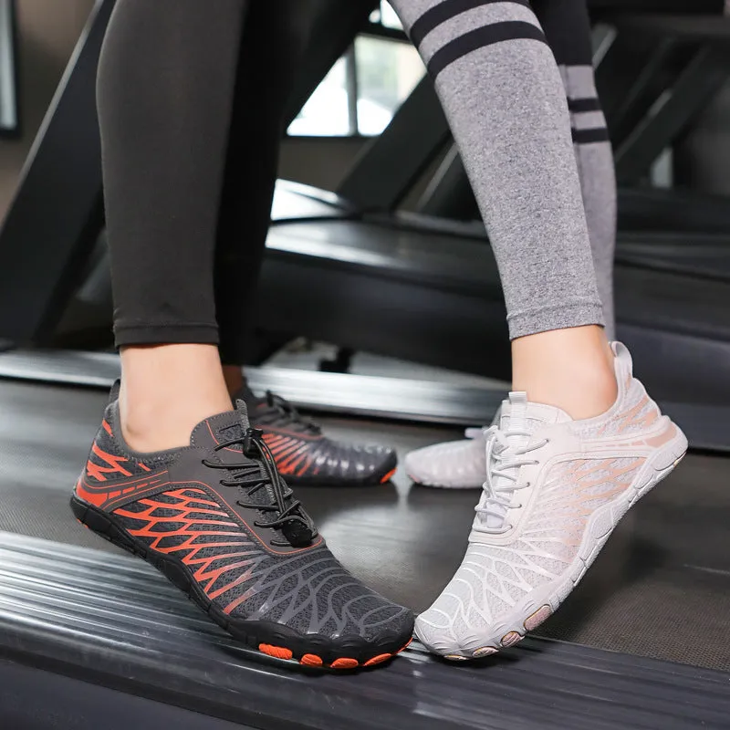 Low-top white outdoor sports shoes with lace-up front and textured rubber sole.