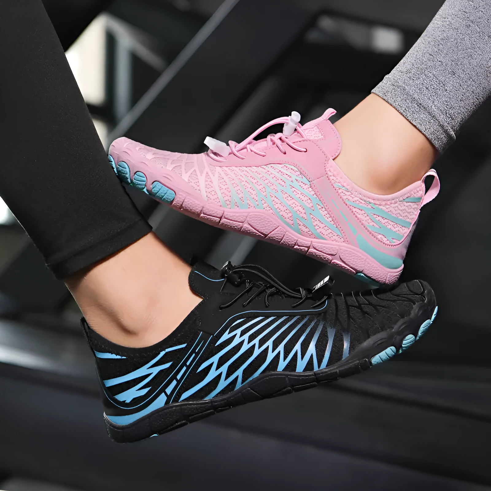Low-top white outdoor sports shoes with lace-up front and textured rubber sole.
