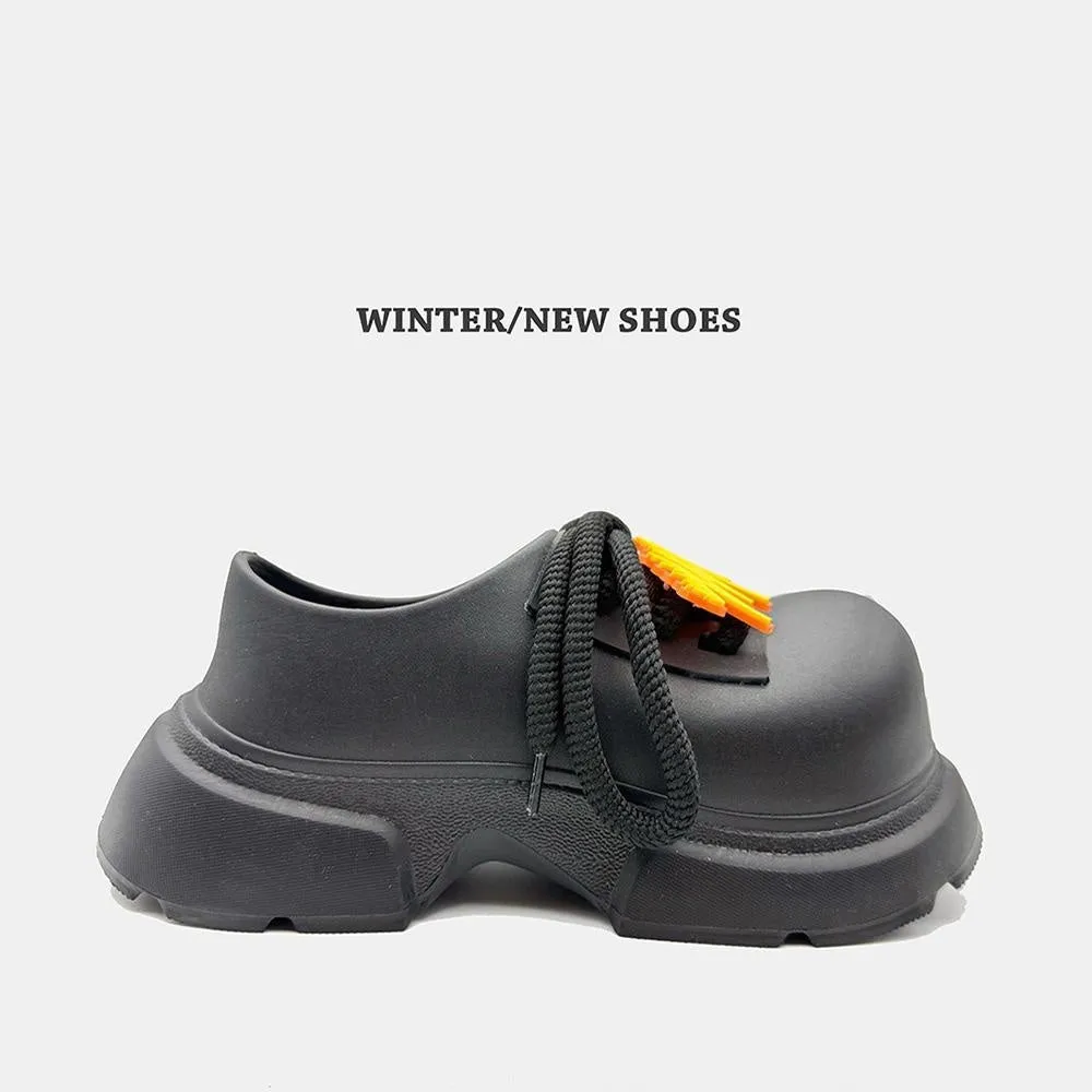 Black Warrior colour thick sole casual shoes for men and women with height increase design.