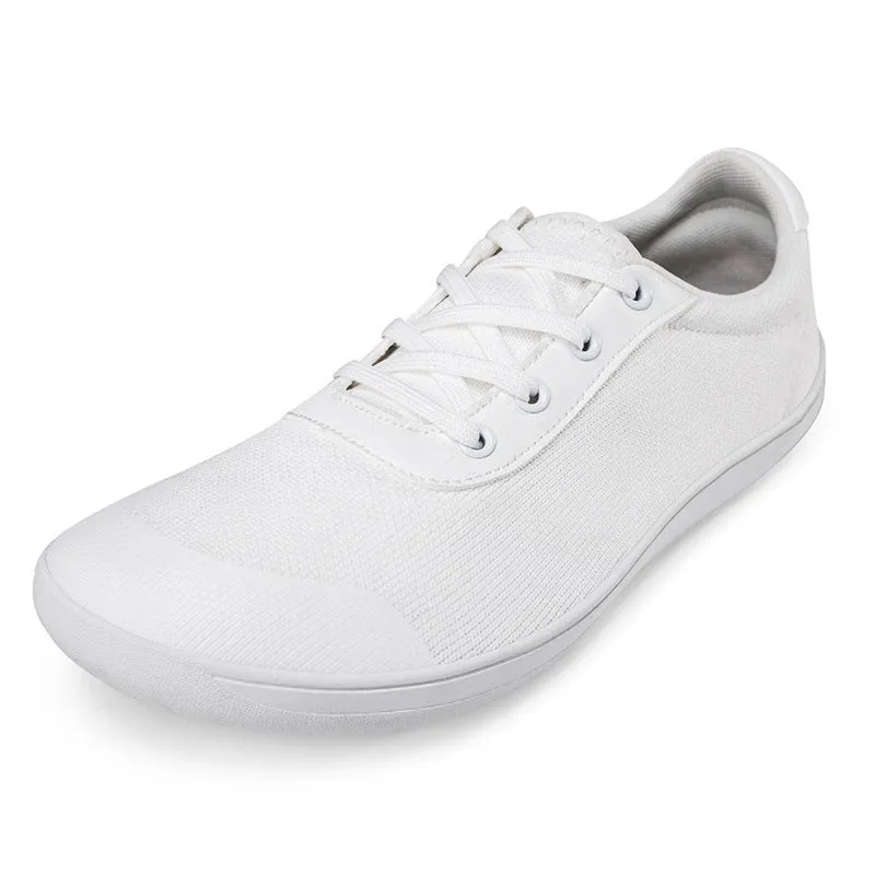 Men's low-top training shoe in a solid colour with a mesh upper and ribbed outsole, shown in a larger size.