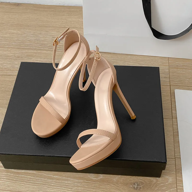 Women's black buckle high heel sandals with round toe and rubber sole