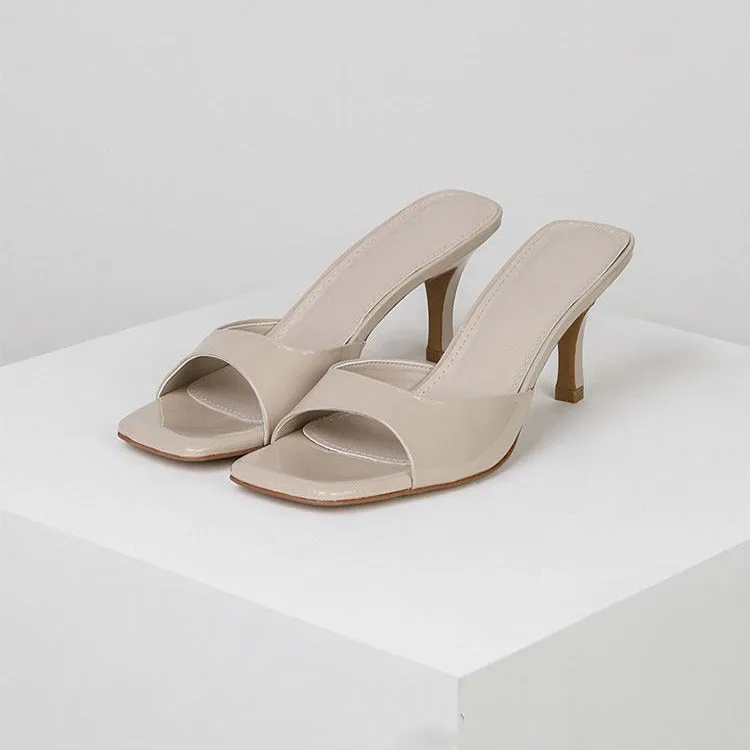 Women's square toe stiletto heel sandals in nude, black, and white on a rubber sole