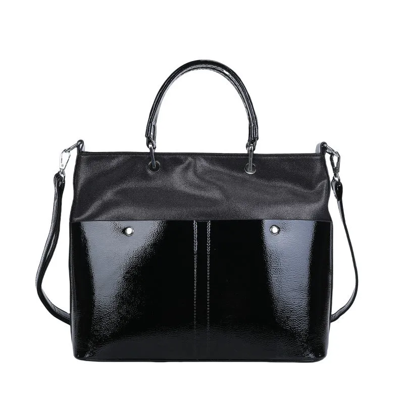 Soft PU shoulder messenger bag in horizontal square shape measuring 33cm by 28cm with sandwich pocket
