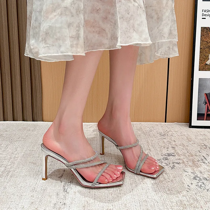 Women's purple satin stiletto sandals with square toe and 8cm heel on a white background.