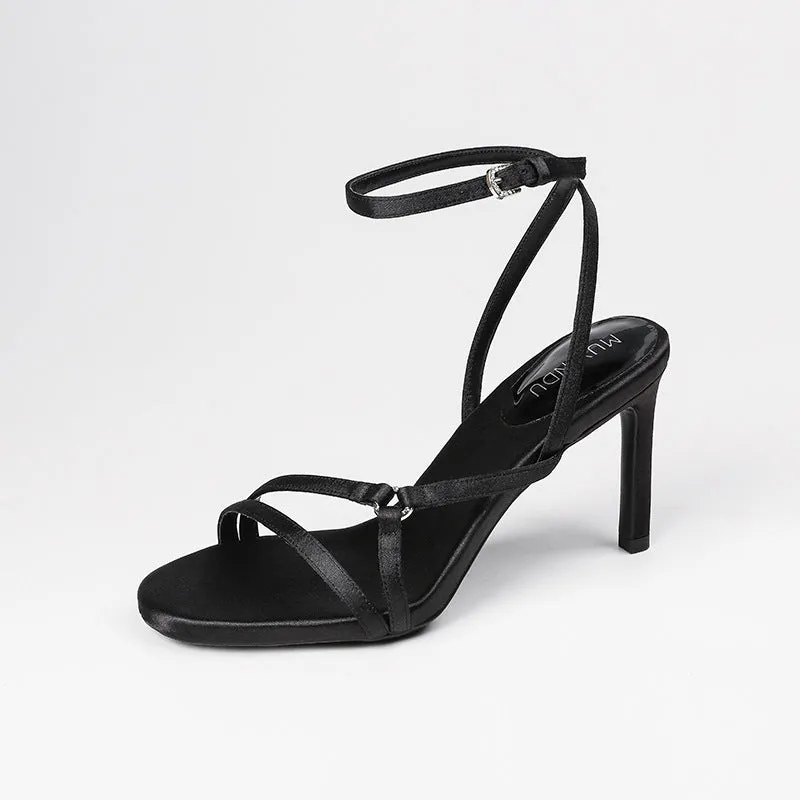 Black women's ankle-strap high heel sandals with satin finish and 8cm heel height