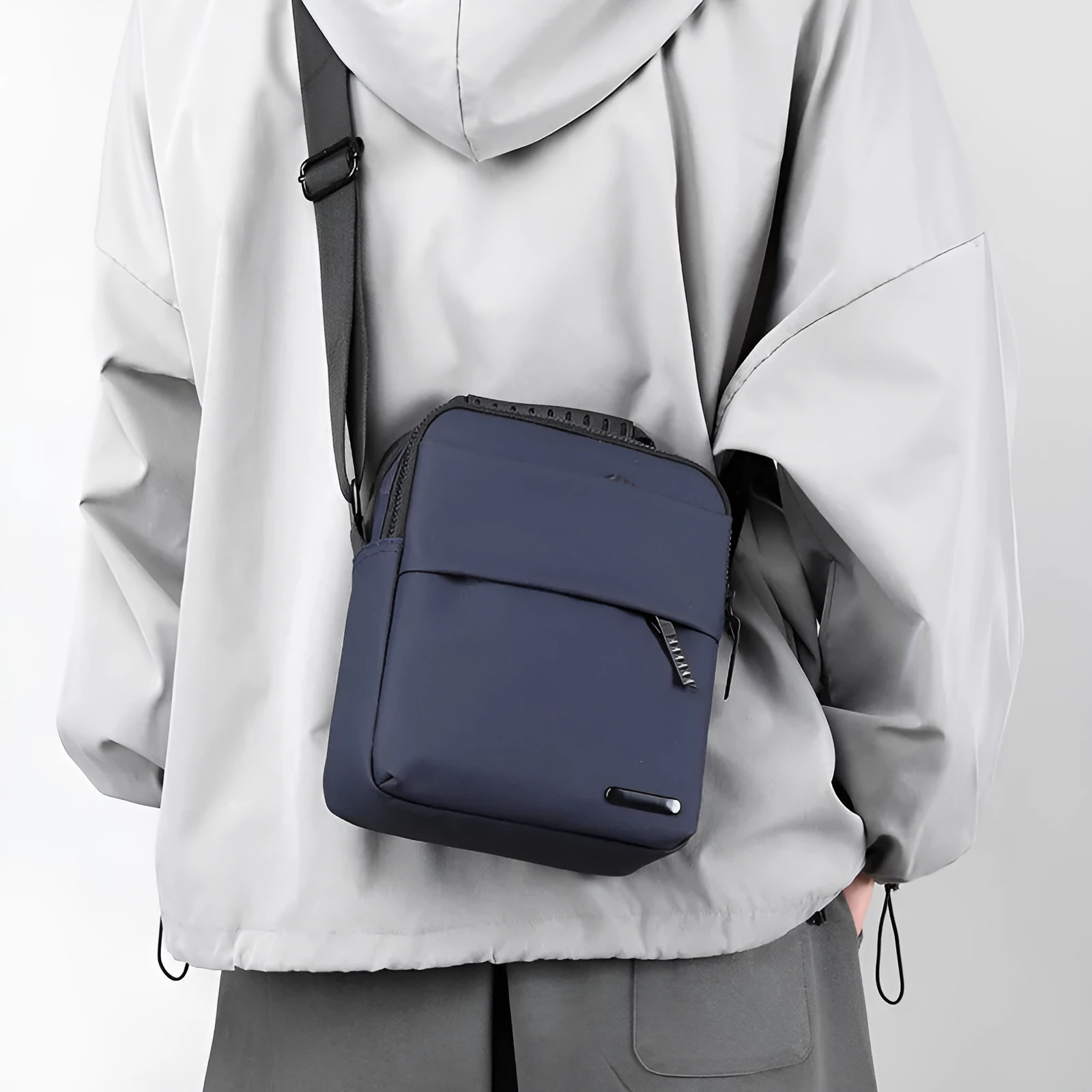 Men's waterproof crossbody bag in army green with PU leather exterior and sewing line detail