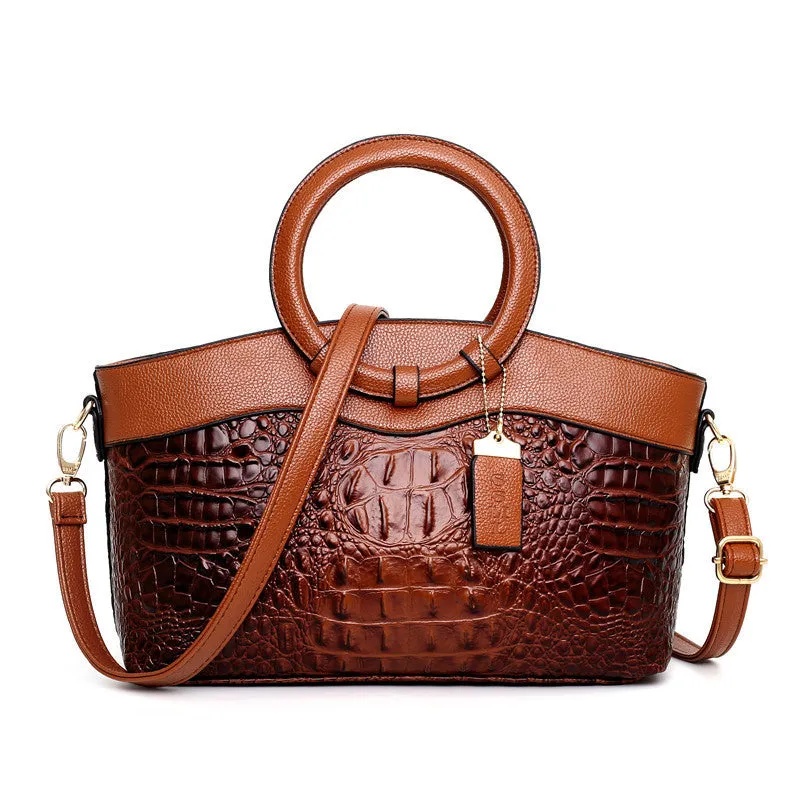 Fabric casual ladies shoulder bag in multiple colours showing zipper compartments and dimensions 31x21x13cm.