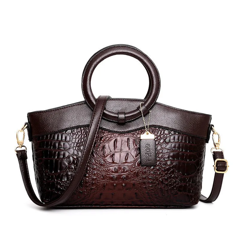 Fabric casual ladies shoulder bag in multiple colours showing zipper compartments and dimensions 31x21x13cm.