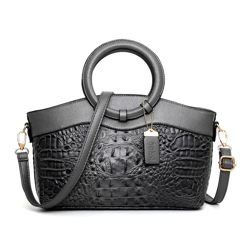 Fabric casual ladies shoulder bag in multiple colours showing zipper compartments and dimensions 31x21x13cm.