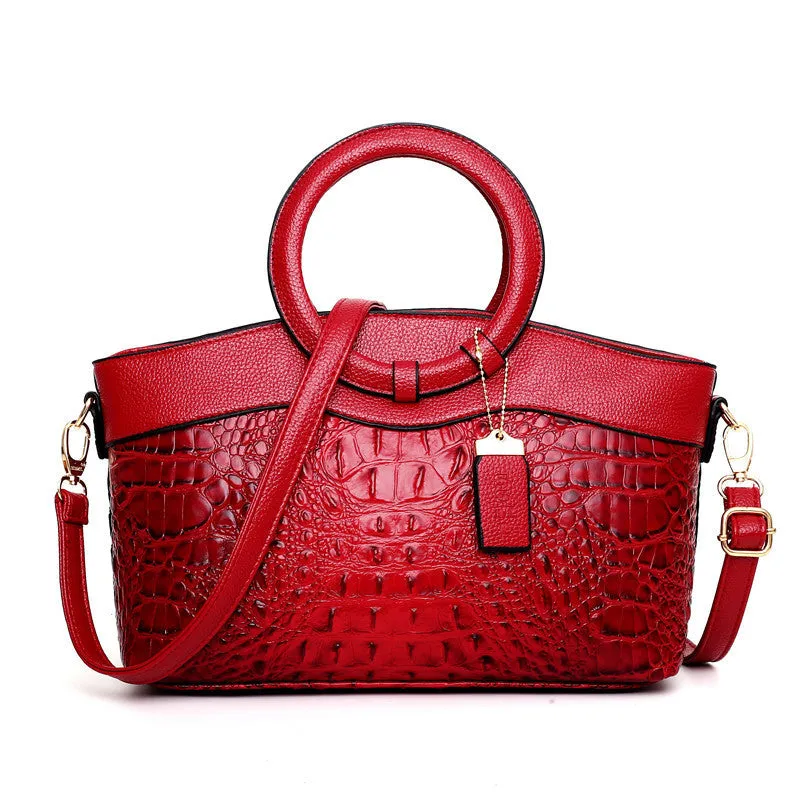 Fabric casual ladies shoulder bag in multiple colours showing zipper compartments and dimensions 31x21x13cm.