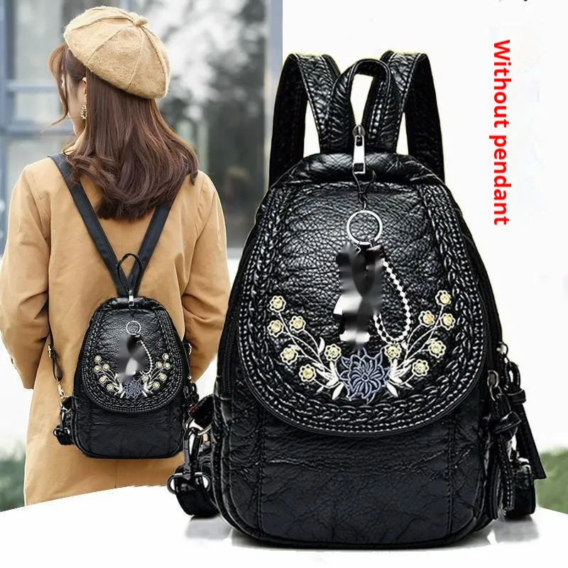 Soft PU leather dual-use chest backpack for ladies in black with visible sewing thread and zippered compartments