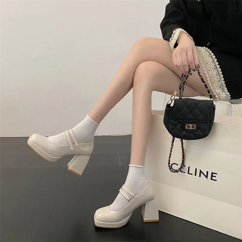 White Mary Jane chunky heel wedding shoes with square toe and buckle closure on a white background