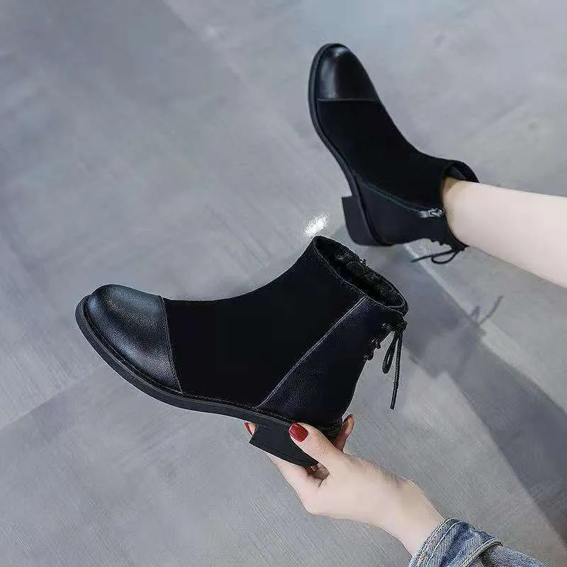 Black women's knee-high Martin boots with side zip and bow detail on a microfibre upper.